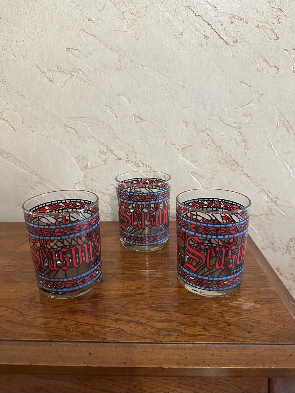 3 Vintage Houze Season’s Greetings 
Red/Blue Tumbler Stained Glass Poinsettia